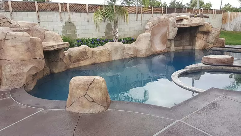 Beautiful Cascade Swimming Pool in Home Backyard